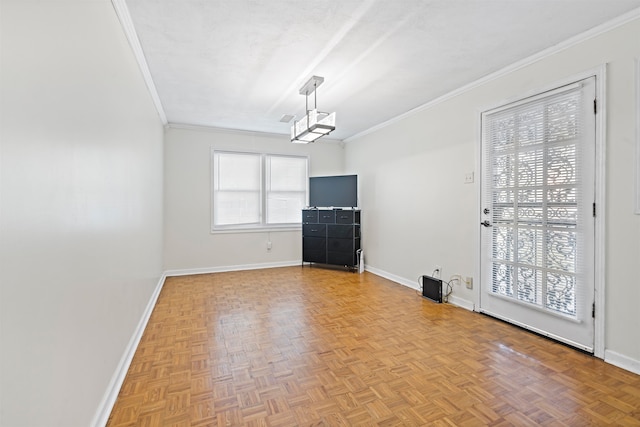 unfurnished living room with parquet flooring and ornamental molding