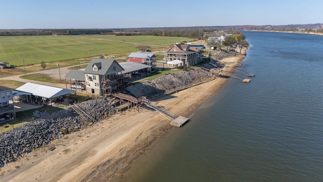 bird's eye view with a water view and a rural view