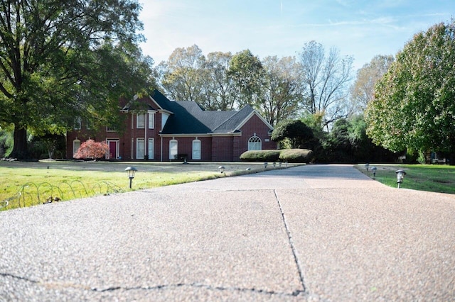 exterior space with a front lawn