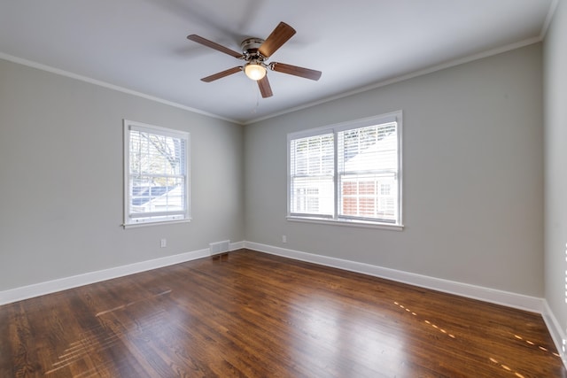 unfurnished room featuring crown molding, ceiling fan, and dark hardwood / wood-style floors