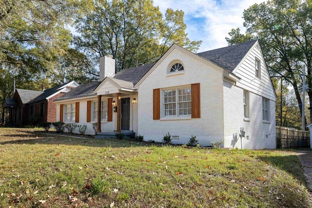 view of front of home with a front lawn