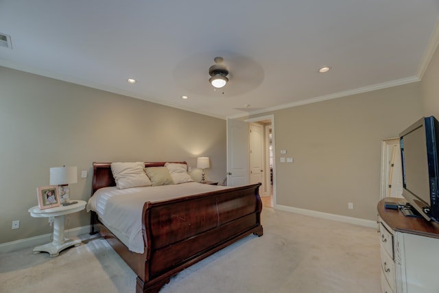 carpeted bedroom with ceiling fan and crown molding