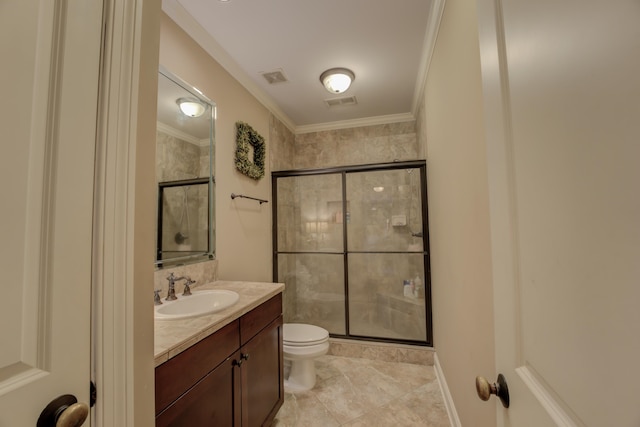 bathroom with tile patterned floors, walk in shower, vanity, crown molding, and toilet