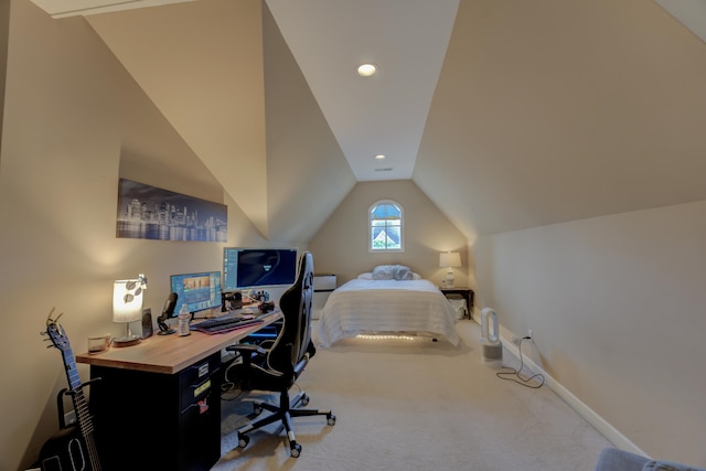 home office featuring carpet and vaulted ceiling