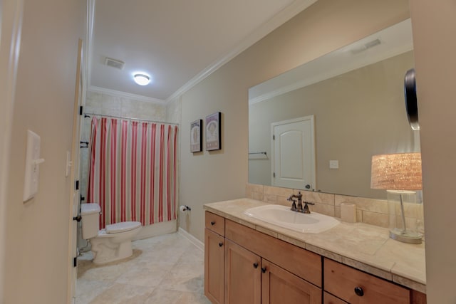 bathroom with vanity, crown molding, tile patterned flooring, toilet, and tasteful backsplash