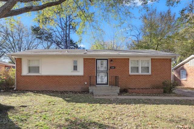 view of front of home with a front lawn