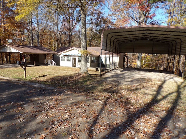 exterior space with a carport