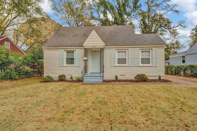 view of front facade with a front yard