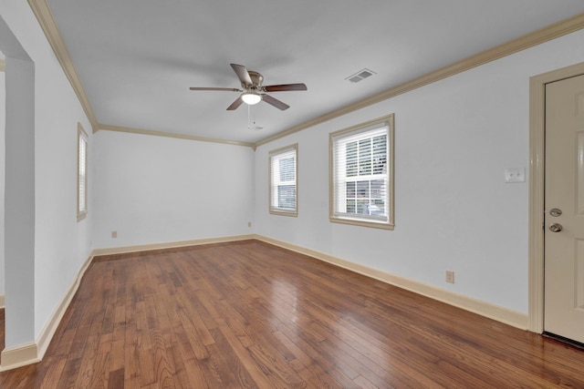 unfurnished room featuring hardwood / wood-style flooring, ceiling fan, and ornamental molding