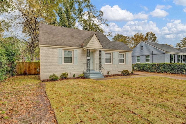 view of front of house with a front lawn