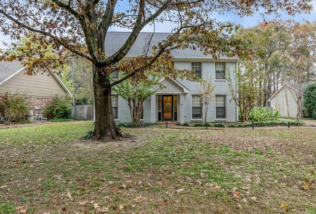 view of front facade with a front lawn