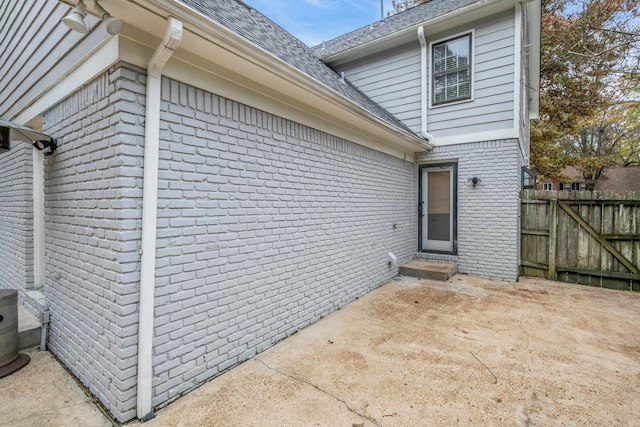 entrance to property featuring a patio