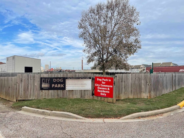 community sign with fence