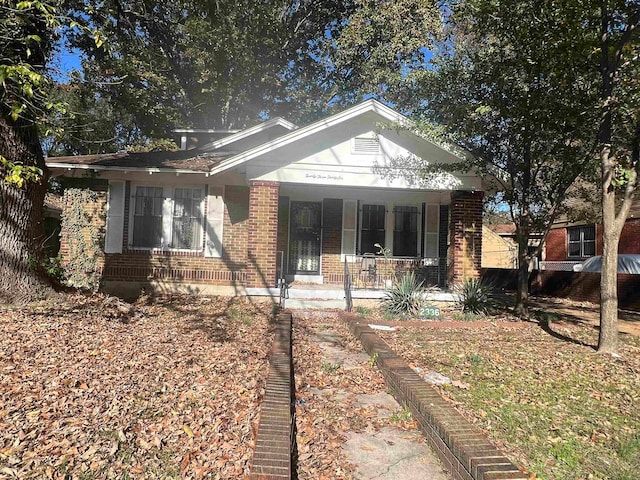 bungalow-style home with a porch