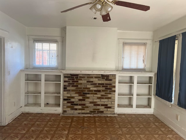 empty room with parquet flooring and ceiling fan