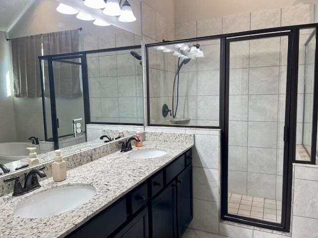 bathroom with vanity and an enclosed shower