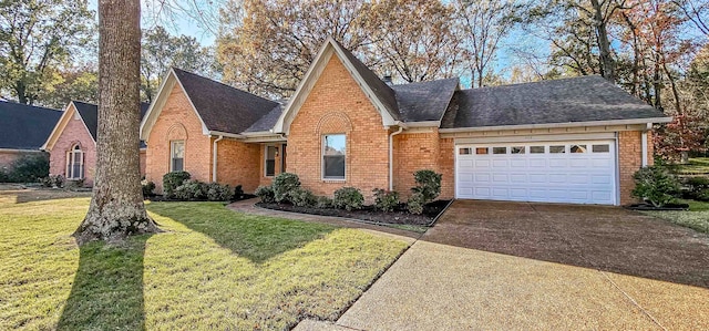 view of front facade with a front lawn and a garage