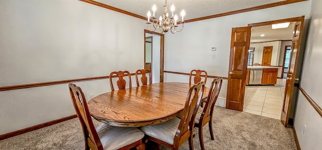 dining area featuring light carpet, crown molding, a textured ceiling, and an inviting chandelier