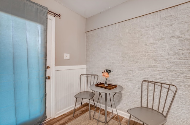 living area with hardwood / wood-style floors