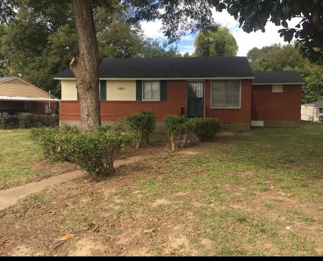 ranch-style house with a front yard