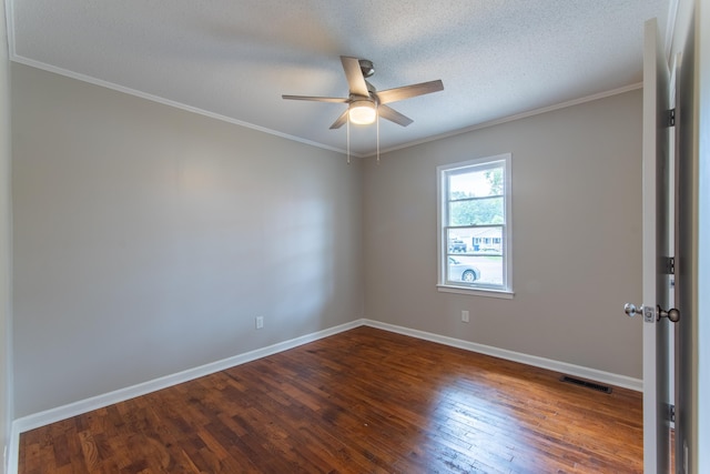 unfurnished room featuring crown molding, ceiling fan, dark wood-type flooring, and a textured ceiling