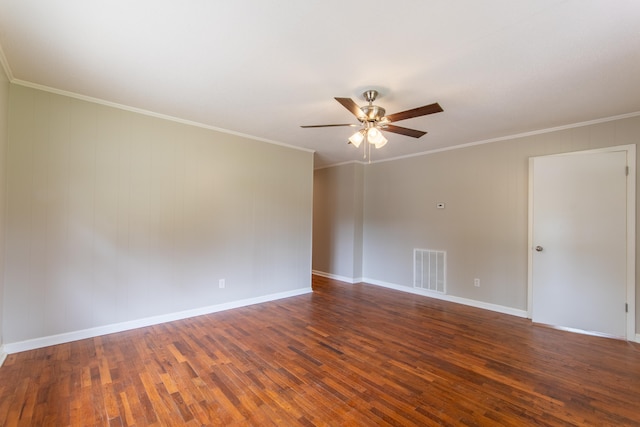 unfurnished room with ceiling fan, dark hardwood / wood-style flooring, and ornamental molding