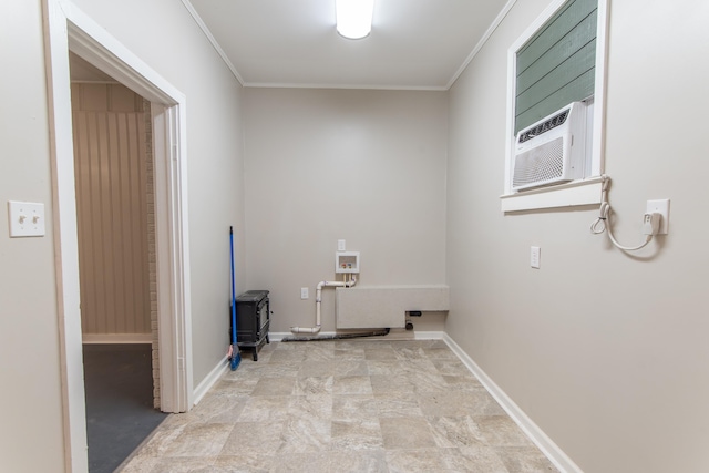 laundry room with cooling unit and ornamental molding