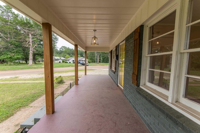 view of patio featuring a porch