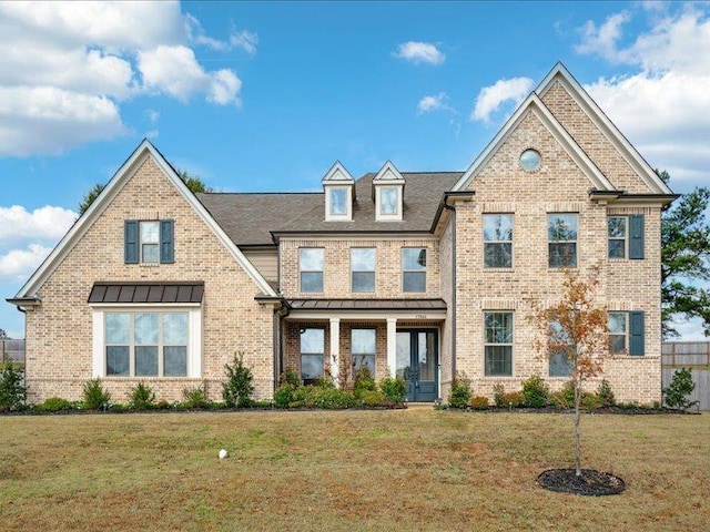 view of front of house featuring a front yard