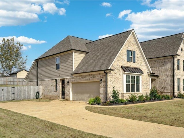 view of home's exterior with a lawn and a garage