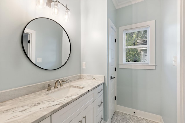 bathroom featuring vanity and ornamental molding