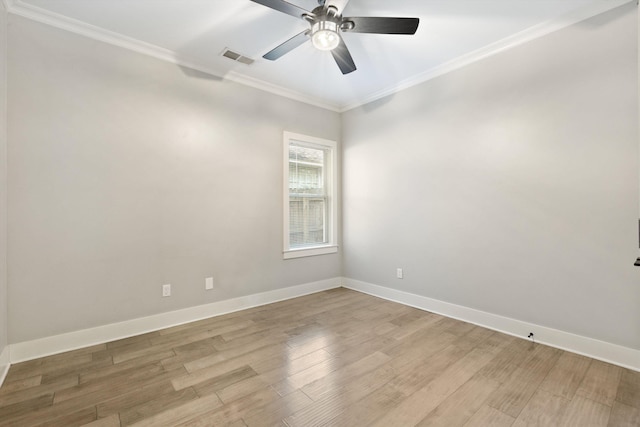 empty room with ceiling fan, light hardwood / wood-style floors, and ornamental molding