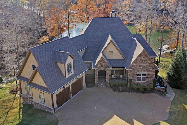 view of front of home with a front lawn and a garage