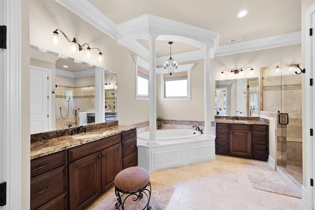 bathroom featuring tile patterned flooring, a notable chandelier, separate shower and tub, vanity, and ornamental molding