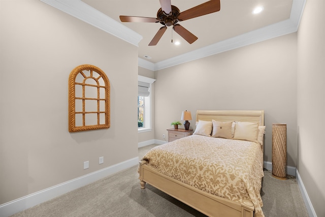 bedroom featuring ceiling fan, crown molding, and light carpet