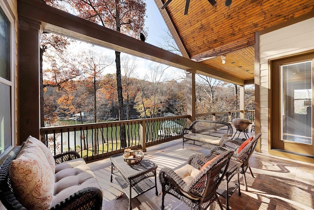 wooden deck with an outdoor hangout area