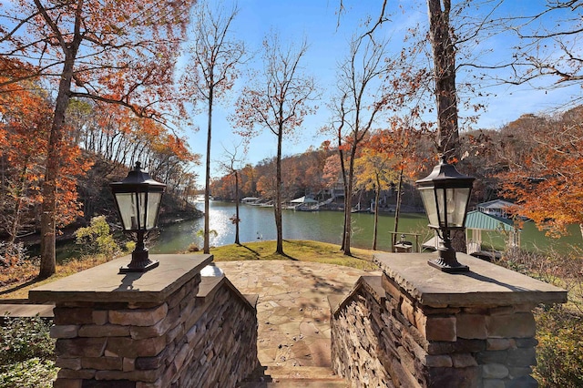 view of patio / terrace with a water view