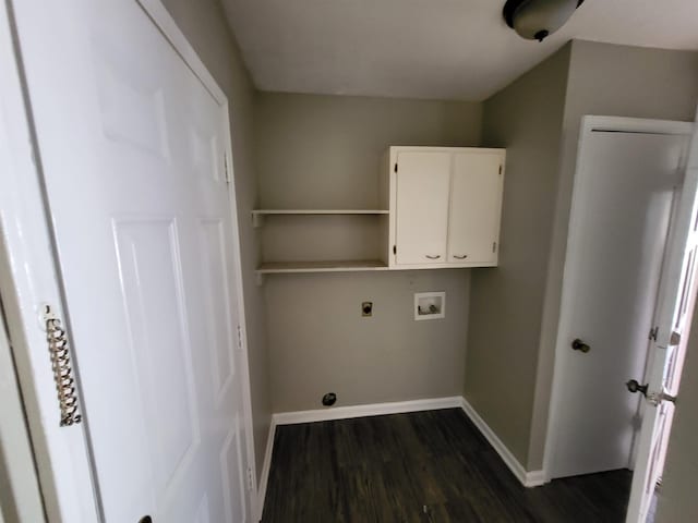 laundry room with electric dryer hookup, cabinets, dark hardwood / wood-style floors, and washer hookup