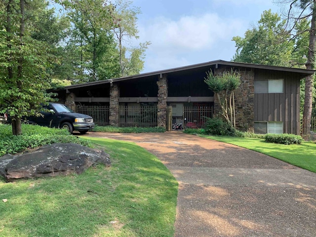 view of outbuilding with a yard