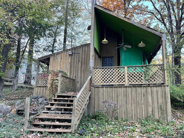 view of home's exterior featuring ceiling fan