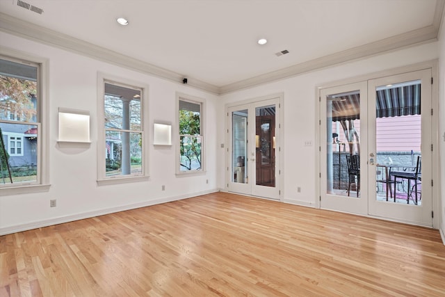 899 Harbor Bend Rd, Memphis, TN 38103 - spare room featuring crown molding, light wood-type flooring, recessed lighting, and french doors