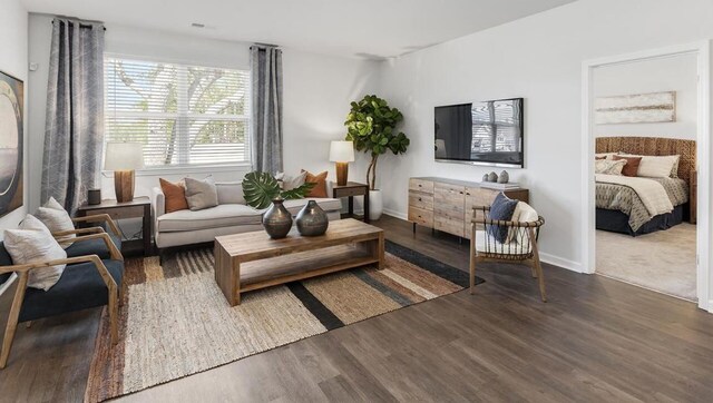 living area with dark wood-type flooring