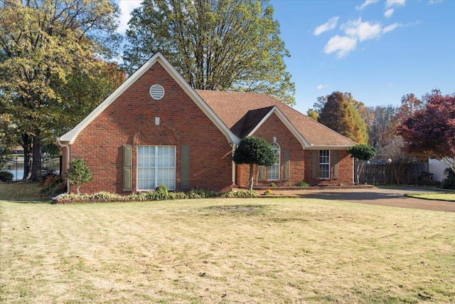 view of front of property with a front lawn