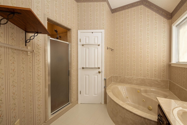 bathroom featuring tile patterned flooring, vanity, and plus walk in shower