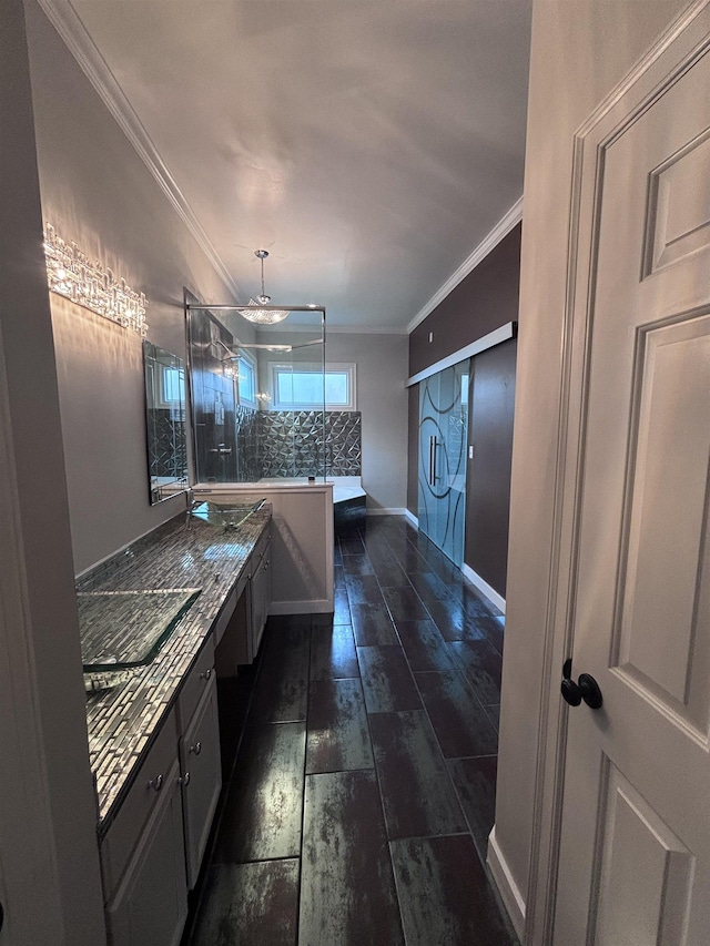 bathroom with ornamental molding and tasteful backsplash