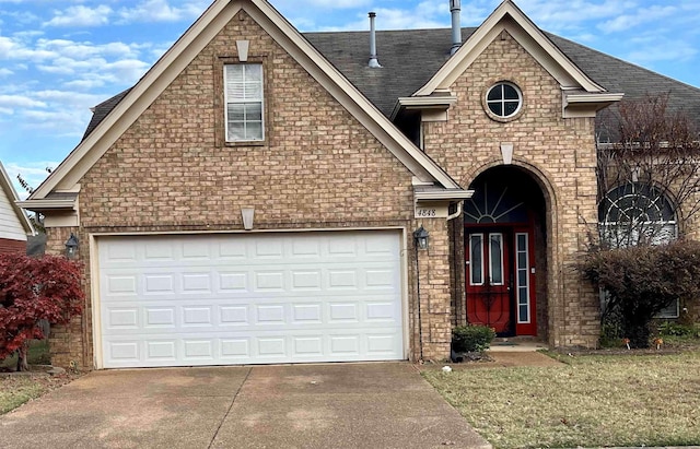 front facade with a garage