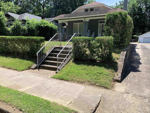 bungalow-style house featuring covered porch