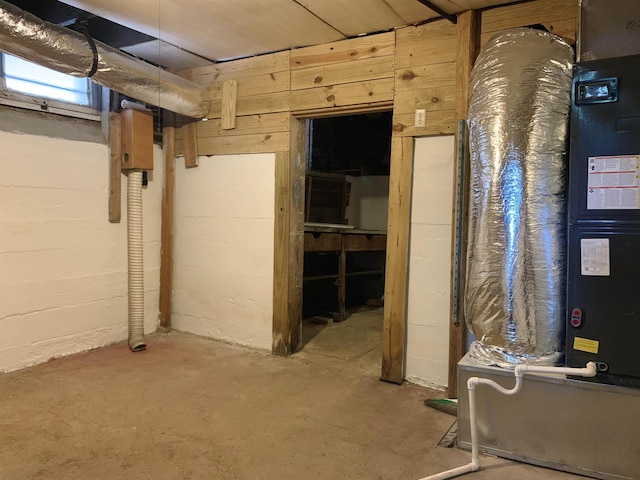 basement featuring heating unit