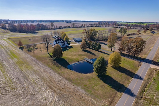 aerial view featuring a rural view and a water view