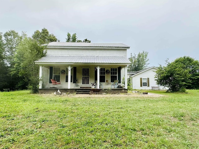 view of front of house featuring a porch and a front lawn